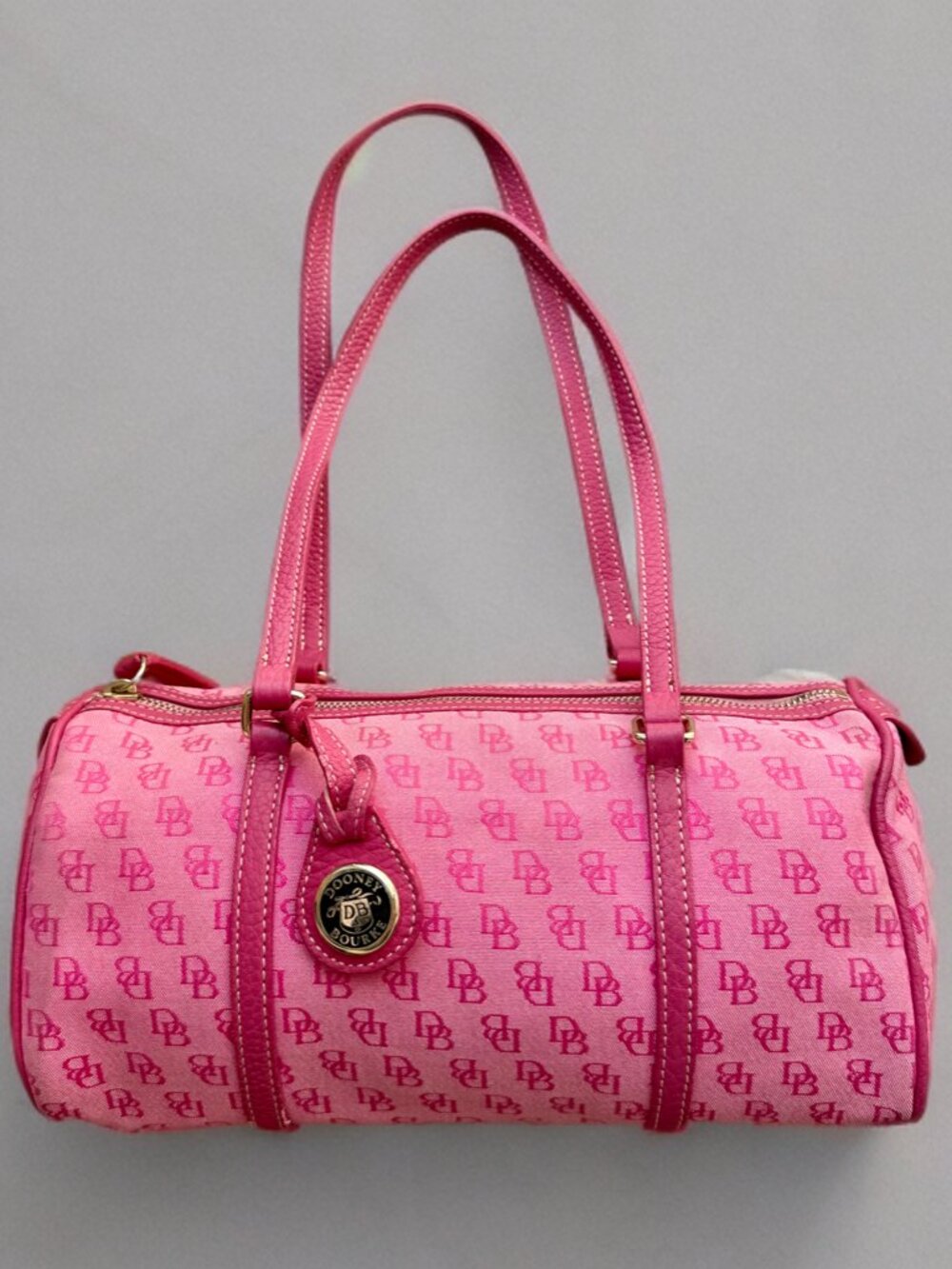 Dooney & Bourke Pink Monogram Canvas Barrel Bag